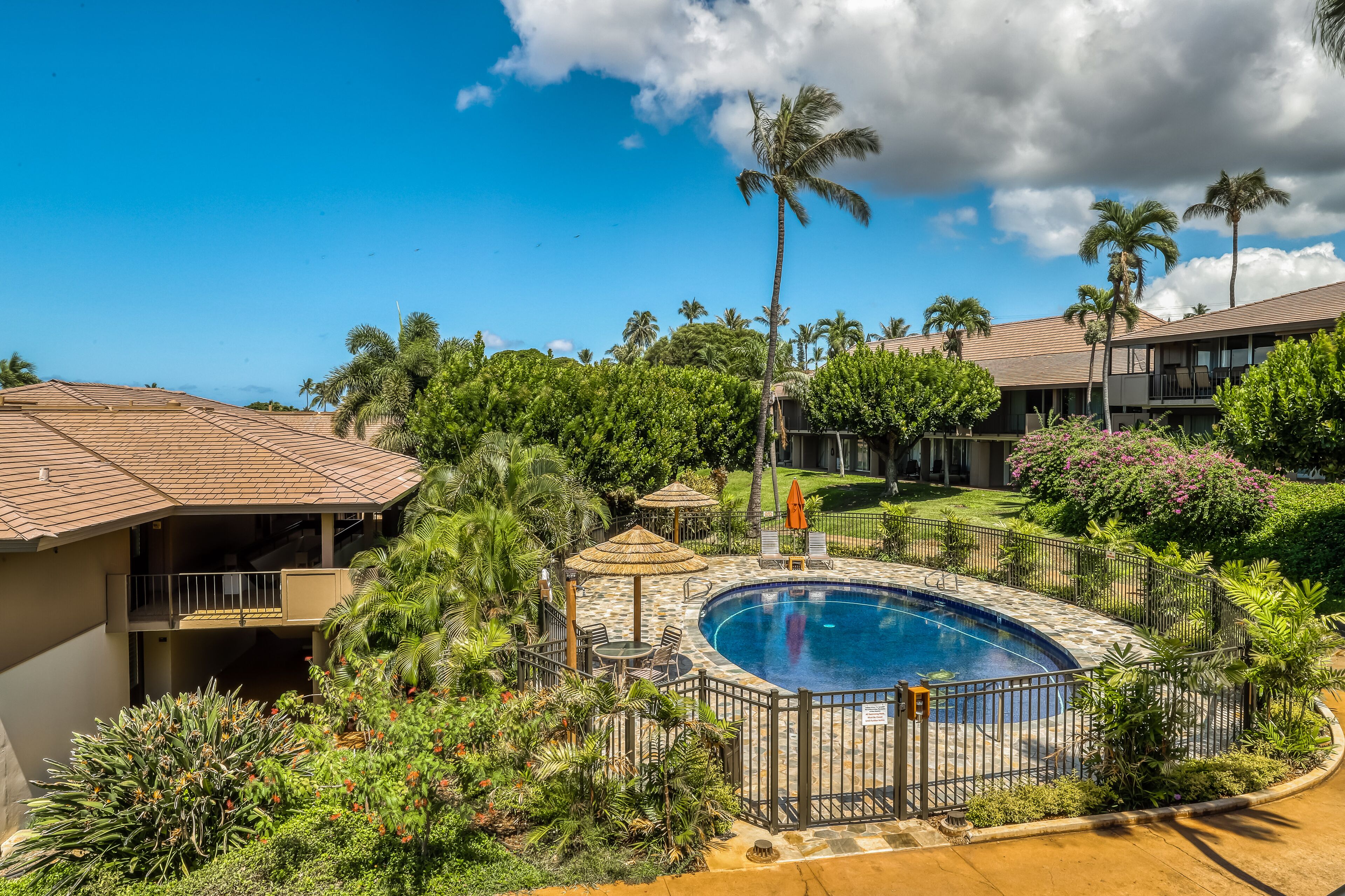 Tranquil tropical retreat with pool, hot tub, and golf nearby