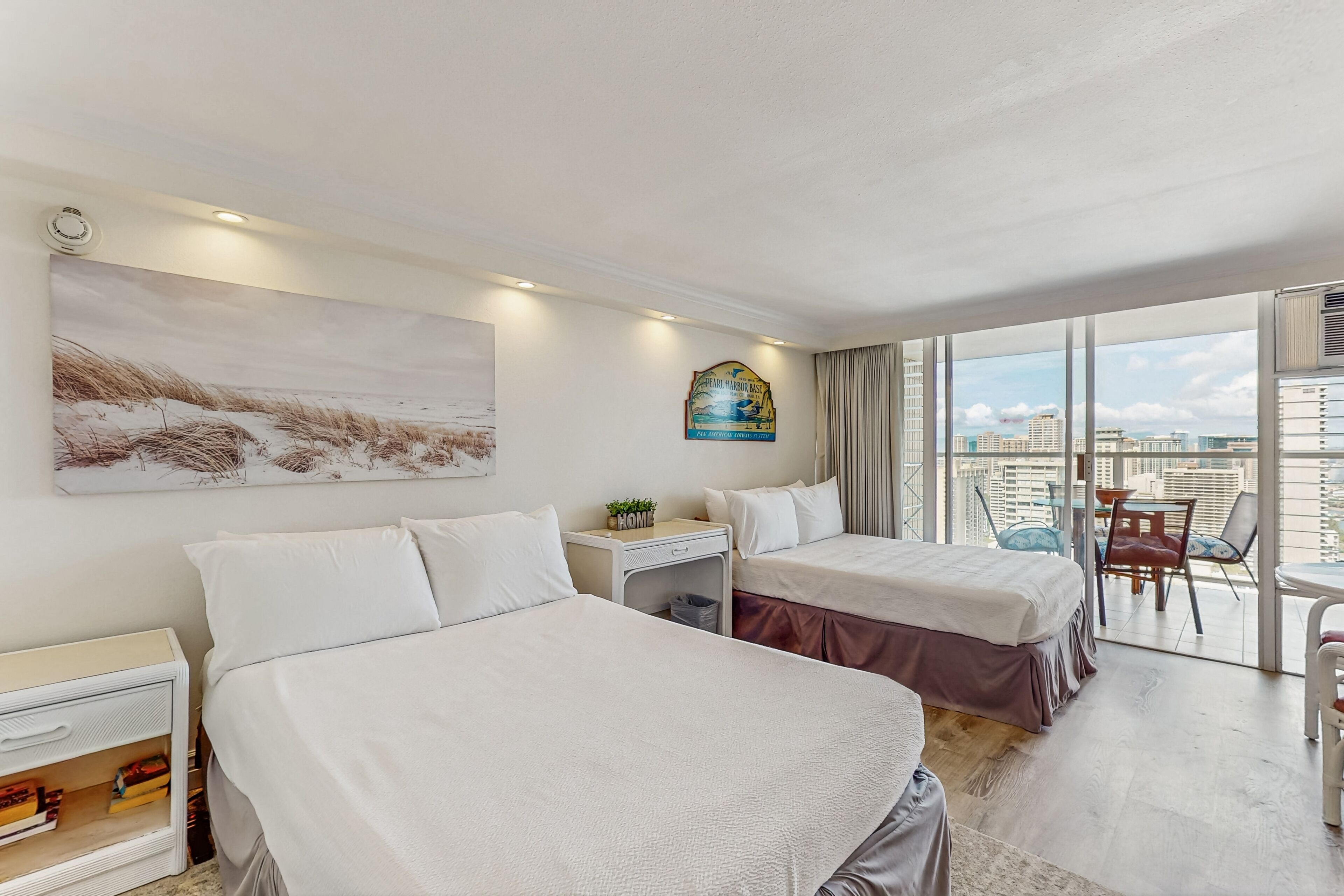 Spacious studio condo with private lanai, kitchenette, & shared pool