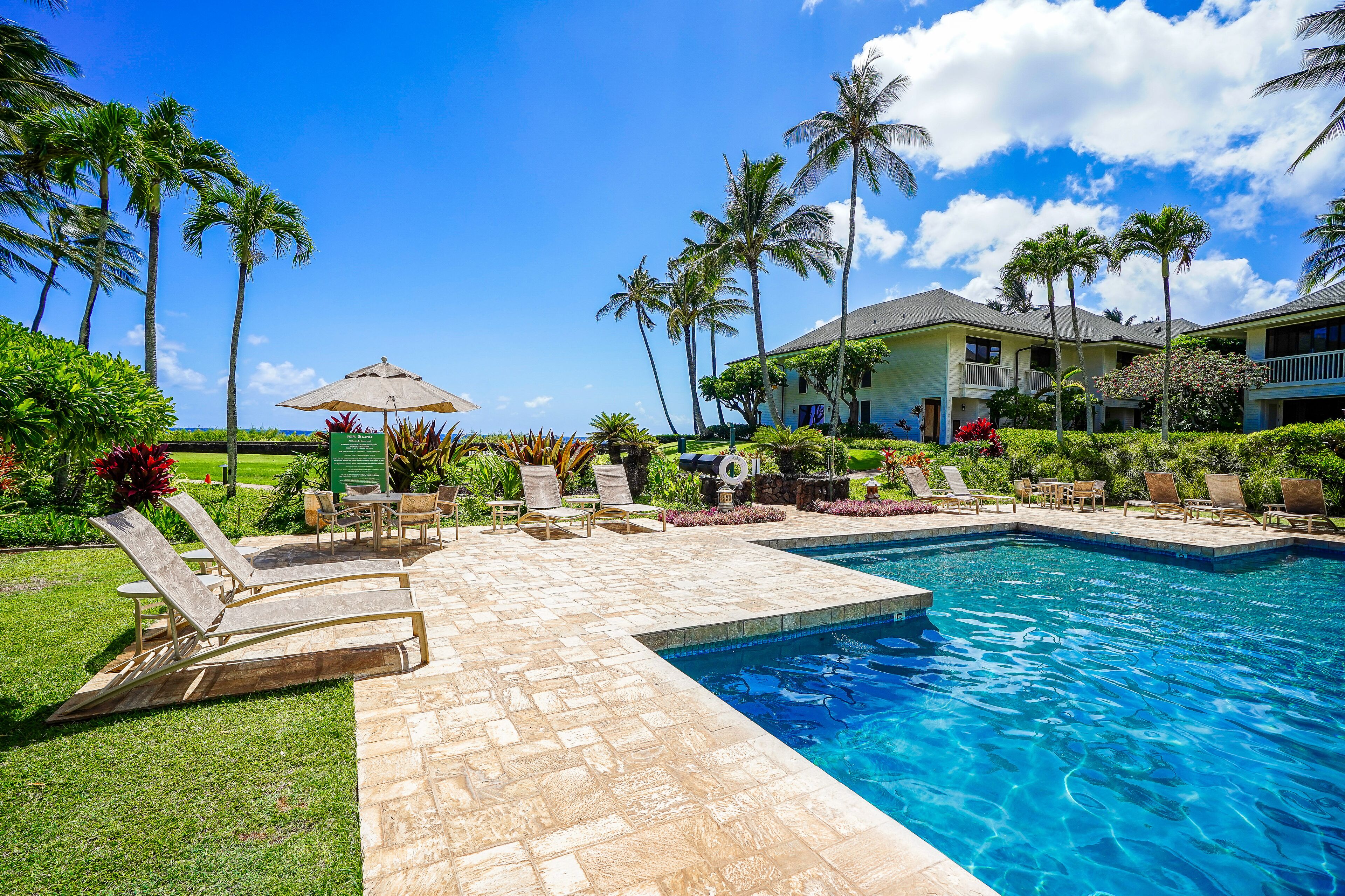 First-floor condo w/ ocean view, washer/dryer, &  outdoor pool
