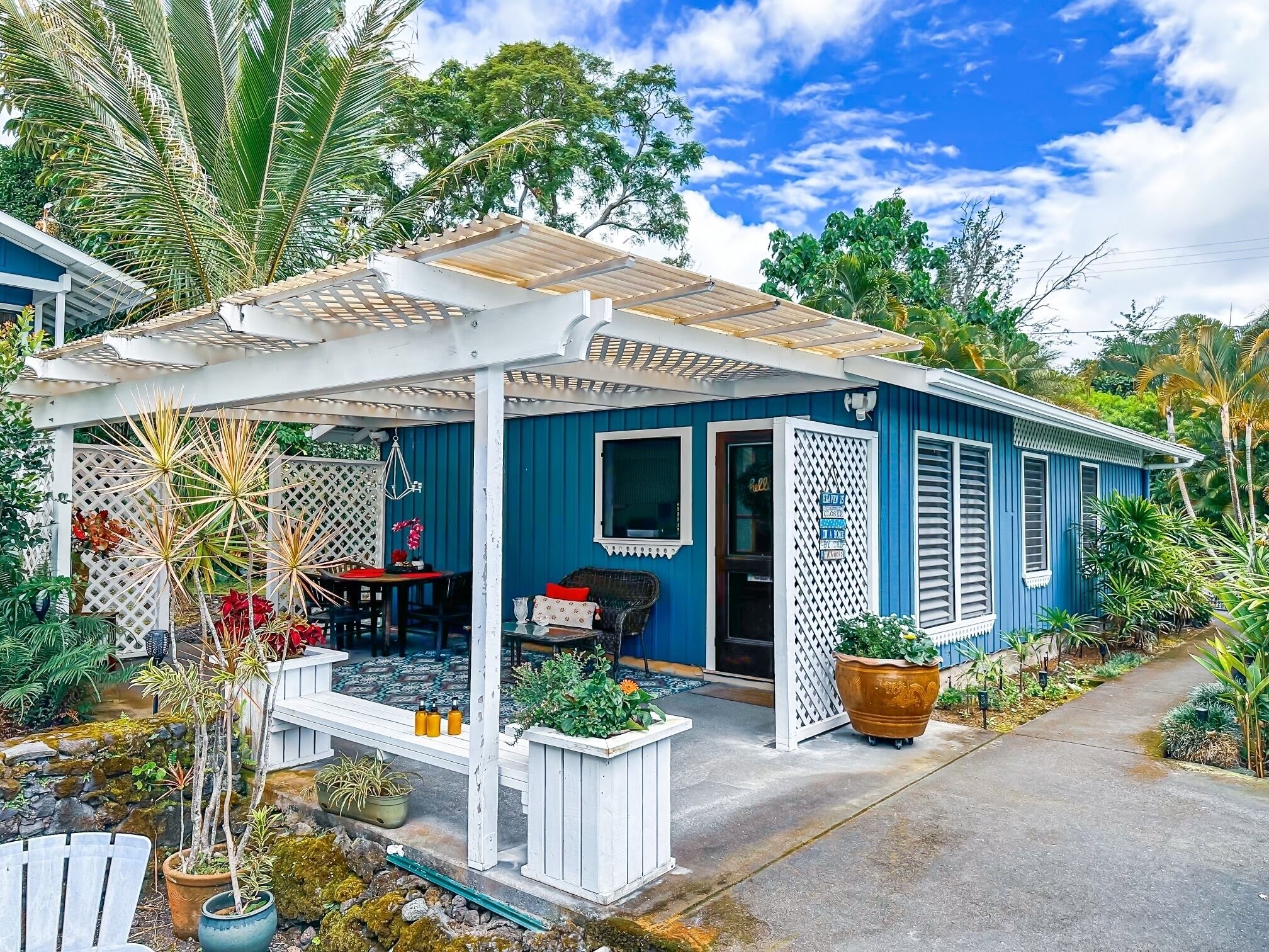 Beachside Cottage surrounded by coffee trees but minutes from the beaches